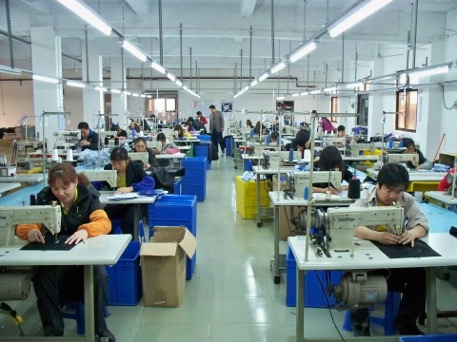Sewing workshop with industrial machines - bag production line